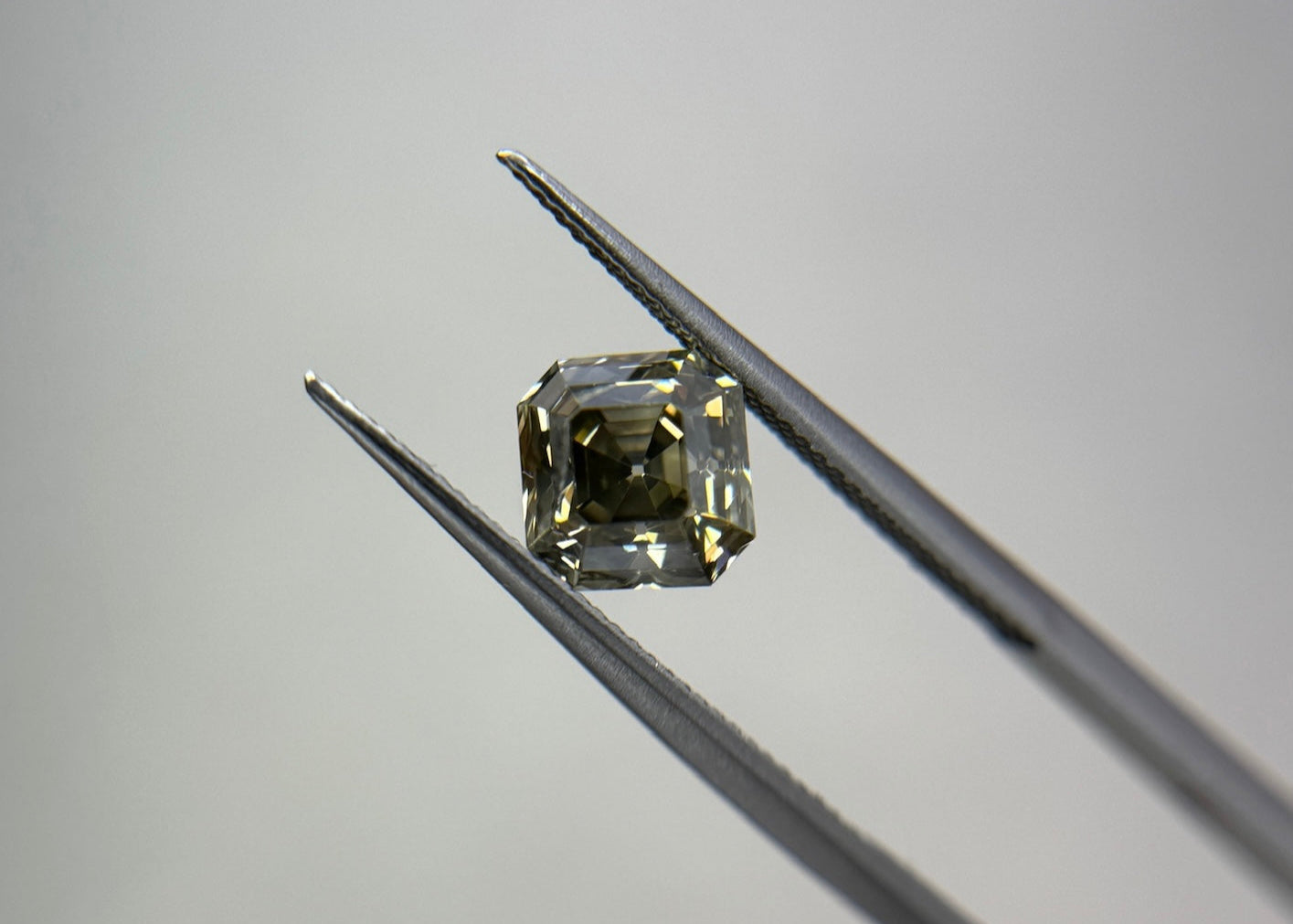 1.04 Asscher Fancy Dark Greenish Grey SI1 GIA